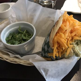 Arepera - Arepa with shredded chicken, avocado, and cheddar cheese - Venezuelan Near Me - Montreal, Quebec Arepera - Arepa with shredded chicken, avocado, and cheddar cheese - Venezuelan Near Me - Montreal, Quebec