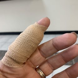 NextCare Urgent Care, Nassua Bay - Bandaged finger
