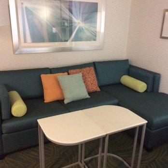 SpringHill Suites by Marriott Wisconsin Dells - Sofa area with pullout. - Hotels Near Me - Wisconsin Dells, Wisconsin