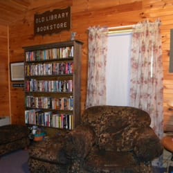 Oak Hill Farm - The library and chairs at the Wolf Cottage.