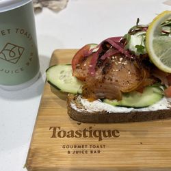 Toastique - Smoked salmon toast with poach egg and tomato - delish!