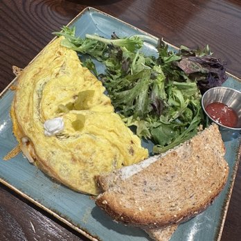 First Watch - Chile chorizo omlette with a side of potatoes - Breakfast & Brunch Near Me - Charlotte, North Carolina