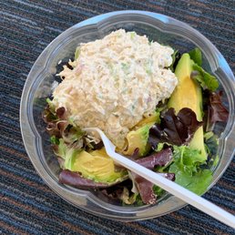 a salad in a bowl with a fork