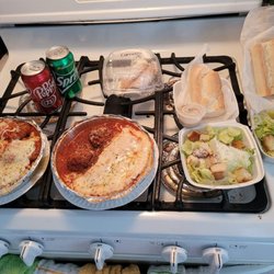 Two dinner special. Manicotti and meatballs, Chicken Parmagiana. Two salads, two rolls, two sodas and two cannoli for $27.95.