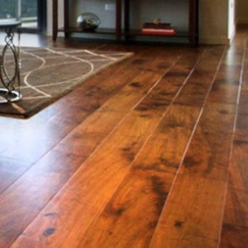 Austin Fine Floors - a hardwood floor in a living room - Carpeting Near Me - Austin, Texas Austin Fine Floors - a hardwood floor in a living room - Carpeting Near Me - Austin, Texas