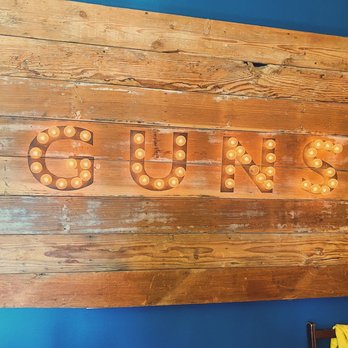 Red Rifle - Sign displayed at shop. - Guns & Ammo Near Me - Carson, California Red Rifle - Sign displayed at shop. - Guns & Ammo Near Me - Carson, California