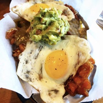 Fardowners Restaurant - battered sweet potato brunch fries with guac and fried eggs, cheese, tomato, and green chili - Burgers Near Me - Crozet, Virginia Fardowners Restaurant - battered sweet potato brunch fries with guac and fried eggs, cheese, tomato, and green chili - Burgers Near Me - Crozet, Virginia