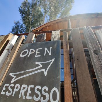 Old Truck - an open espresso sign in a junkyard - Coffee & Tea Near Me - Cornell, California