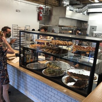 Pizza Thief - Pizza Thief portland: pizza case at the counter with pies and desserts. - Pizza Near Me - Portland, Oregon Pizza Thief - Pizza Thief portland: pizza case at the counter with pies and desserts. - Pizza Near Me - Portland, Oregon