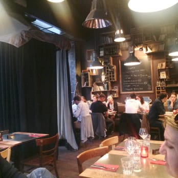 Le Clan des Belges - Interior of Le Clan des Belges, in front room, looking toward the front door - Belgian Near Me - Ixelles, BRU Le Clan des Belges - Interior of Le Clan des Belges, in front room, looking toward the front door - Belgian Near Me - Ixelles, BRU