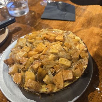 FUEGOS LA - Argentina potatoe tortilla i believe this was called. If you're an onion lover,heaven. If your not, still enjoy the flavors and textures. - Empanadas Near Me - Los Angeles, California