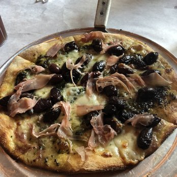 Midtown Pizza Kitchen - Small pizza with pesto, buffalo mozzarella, prosciutto, and kalamata olives. SO good! - Pizza Near Me - Montgomery, Alabama