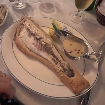 La Goulue Palm Beach - Bronzino in salted pastry crust - French Near Me - Palm Beach, Florida La Goulue Palm Beach - Bronzino in salted pastry crust - French Near Me - Palm Beach, Florida