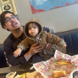 We had to fight the baby off from eating our food We had to fight the baby off from eating our food