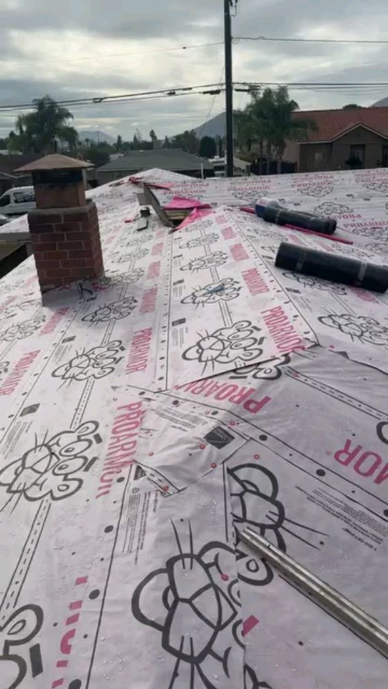 Slide of EF Roofing Services