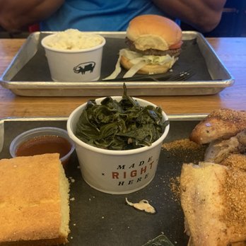 Black Hog BBQ - Chicken Platter with Southern greens and cornbread in foreground  Burger and cole slaw in background - Barbeque Near Me - Frederick, Maryland
