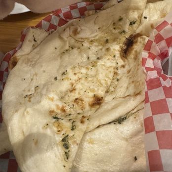 Indian Curry House - Garlic naan...not even that great either smh - Indian Near Me - Banff, Alberta