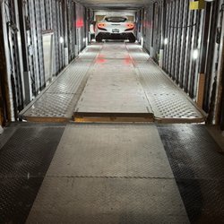 Motorcars - Taking delivery.