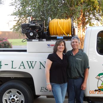 Irish Green Lawn Care - a man and woman standing in front of a lawn care truck - Lawn Services Near Me - Moore, Oklahoma Irish Green Lawn Care - a man and woman standing in front of a lawn care truck - Lawn Services Near Me - Moore, Oklahoma