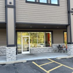 Chino Loco Taqueria - View of restaurant from parking lot. Business is located on the side of a strip mall.