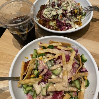 CAVA - Top: honey chicken (super green/jasmine rice)  Bottom: basked lamb (super green/ jasmine rice)  + toppings and sauces! - Mediterranean Near Me - Irving, Texas