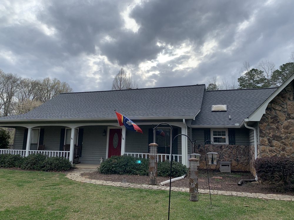 Slide of Martin Roofing