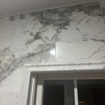 NS Flooring - Tile above window should be glossy tile. One tile above window is matte surrounded by glossy tile. POOR WORKMANSHIP! - Flooring Near Me