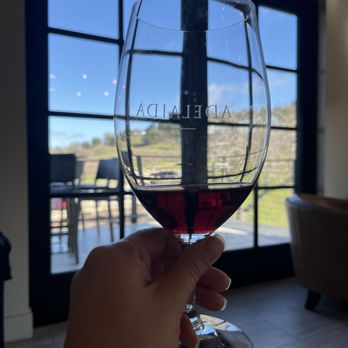 Adelaida Vineyards & Winery - Wine pour and view - Wineries Near Me - Paso Robles, California Adelaida Vineyards & Winery - Wine pour and view - Wineries Near Me - Paso Robles, California