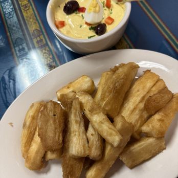 Taste of Peru - Yuca a la Huancaina - Peruvian Near Me - Chicago, Illinois Taste of Peru - Yuca a la Huancaina - Peruvian Near Me - Chicago, Illinois