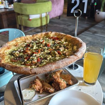 Salud Cerveceria - Humble Rumble pizza and garlic parm wings - Breweries Near Me - Charlotte, North Carolina
