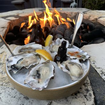 Stokes Adobe - Fresh oysters, well presented and with seasoning options. - New American Near Me - Monterey, California