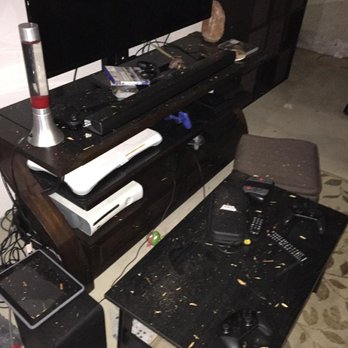 Empire Today - That TV sitting there no longer worked after wood went down through the vents in the back. - Carpet Installation Near Me Empire Today - That TV sitting there no longer worked after wood went down through the vents in the back. - Carpet Installation Near Me