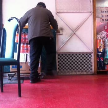 Maritime Chinese Take Out Restaurant - a man standing in front of a door - Chinese Near Me - Norwalk, Connecticut