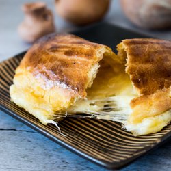 You won't find any empanadas with as much cheesy goodness as ours.
