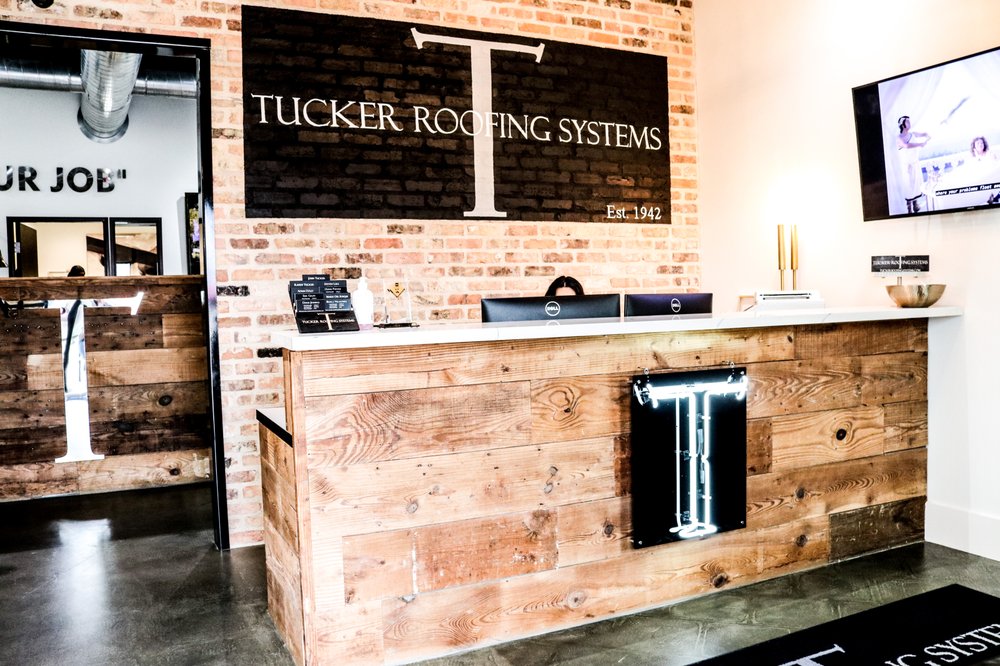Slide of Tucker Roofing Systems