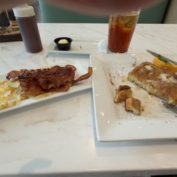 French toast combo with eggs and bacon.