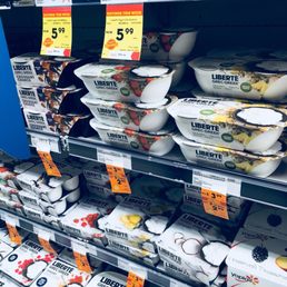 a display of yogurt in a grocery store
