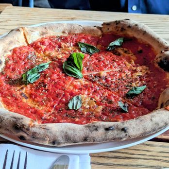 Tavola - The excellent plain tomato pie. No cheese (just ask for some Parmesan). Great sauce. Great crust. Bonus: oesn't leave you feeling sick. A+ - Italian Near Me - New York, New York