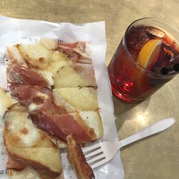 Pizza with speck ham and potato, and a great Negroni. Pizza with speck ham and potato, and a great Negroni.