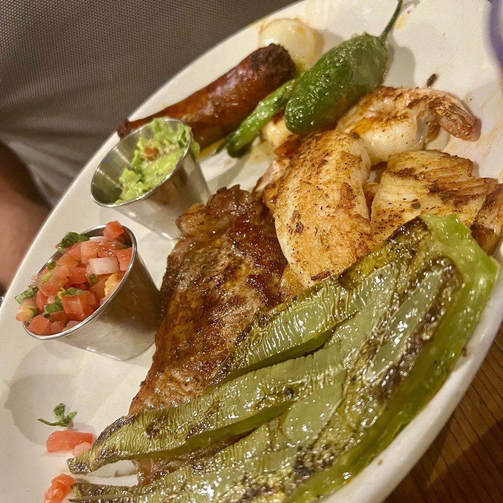 Mi Lindo Cancun Grill - Oaxaca combo. Wow so good! chorizo shrimp steak and tilapia! All had amazing flavor - Mexican Near Me - Annapolis, Maryland