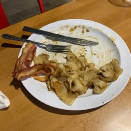 I only ate the omlette, which was cooked properly.  Get sandwich and fries...not...breakfast food.