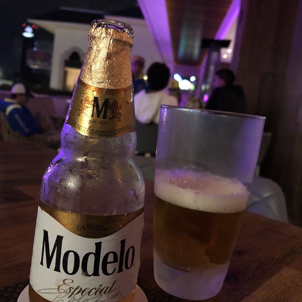 HS Hotsson Hotel - A cold Modelo on the patio. - Hotels Near Me - León, GUA