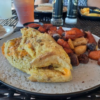 The Shack Riverfront - Omelette with fried sweet potatoes - Seafood Near Me - Palm Bay, Florida The Shack Riverfront - Omelette with fried sweet potatoes - Seafood Near Me - Palm Bay, Florida
