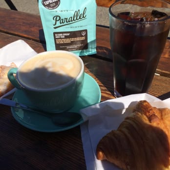 49th Parallel Coffee - 16oz bag, cold brew, vanilla latte, butter croissant, and a lemon poppyseed doughnut. Get the coffee + doughnut for $5! - Cafes Near Me - Vancouver, British Columbia 49th Parallel Coffee - 16oz bag, cold brew, vanilla latte, butter croissant, and a lemon poppyseed doughnut. Get the coffee + doughnut for $5! - Cafes Near Me - Vancouver, British Columbia