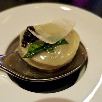 The Aviary - Black Truffle Explosion, truffle butter filled ravioli, shaved black truffle, romaine, parmesan - Cocktail Bars Near Me - Chicago, Illinois