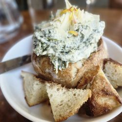 Peaceful Belly Farm - Spinach dip bread bowl in Acme sourdough loaf