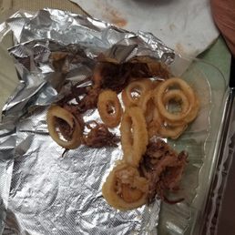 This is what passed for an order of Calimari in our takeout dinner. Looks like somebody's garbage that had been cleared from their table. This is what passed for an order of Calimari in our takeout dinner. Looks like somebody's garbage that had been cleared from their table.