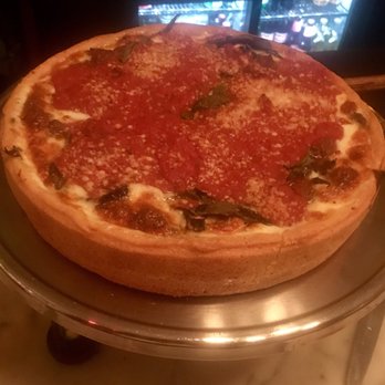 Emmett's - Deep dish with basil, sausage, mushrooms and caramelized onions - YUMMMM. Crust was so thick and buttery. - American Near Me - New York, New York