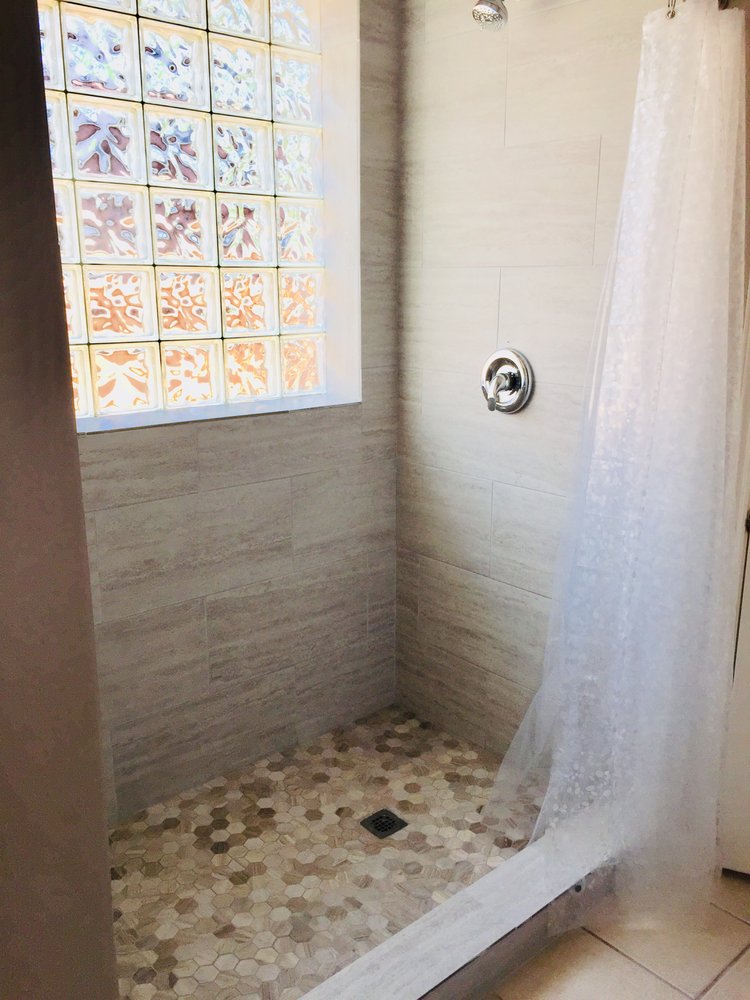 Slide of Odessey Roofing and Remodeling