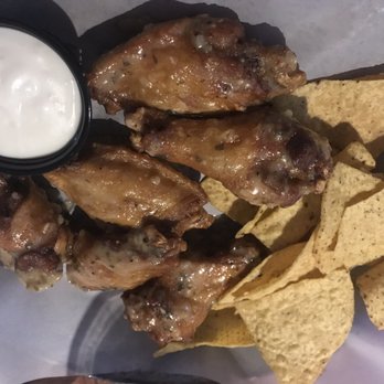 Adobe Gilas - Garlic Parmesan wings w/ a a side of chips - Mexican Near Me - Rosemont, Illinois